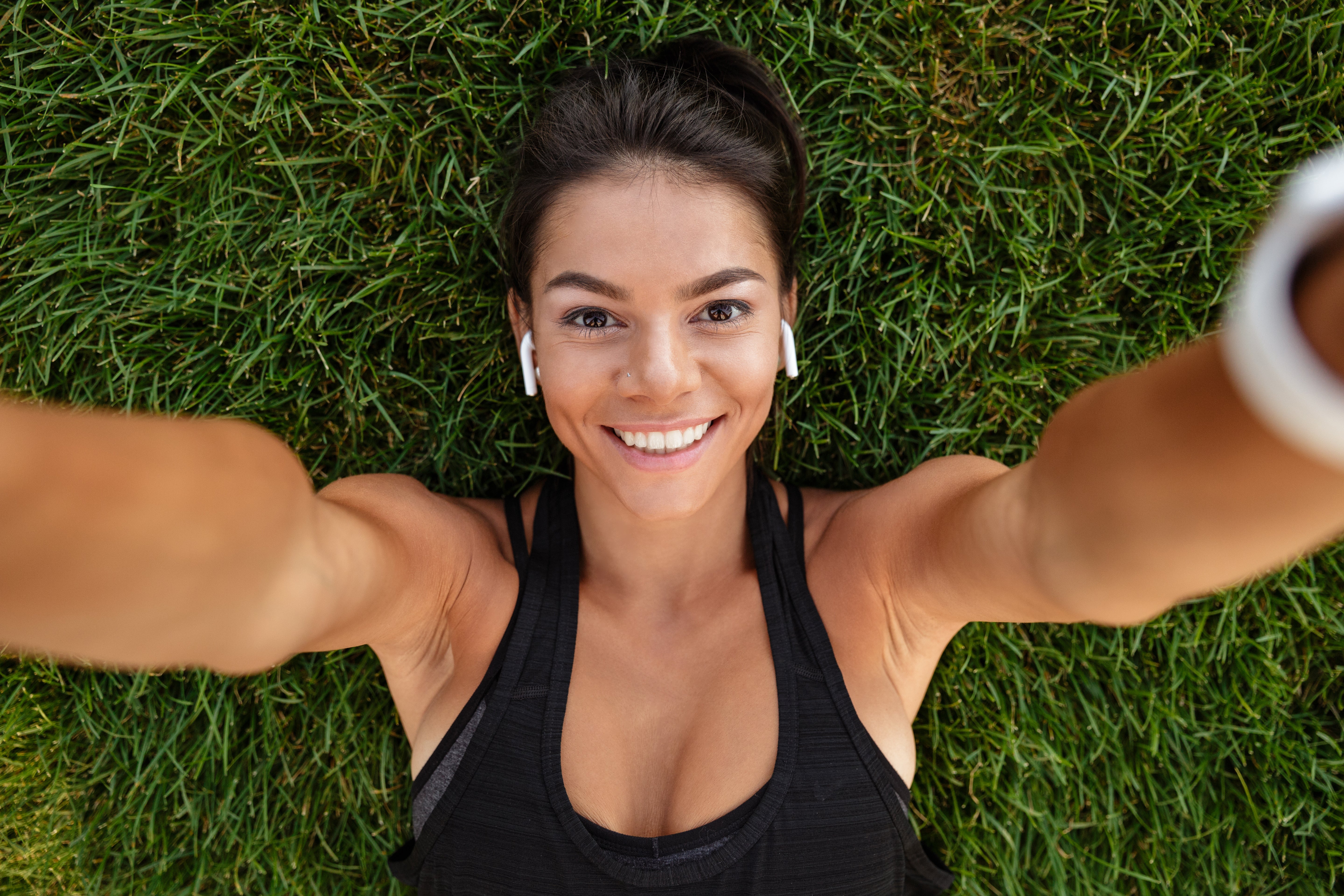 files/close-up-happy-fitness-woman-earphones.jpg